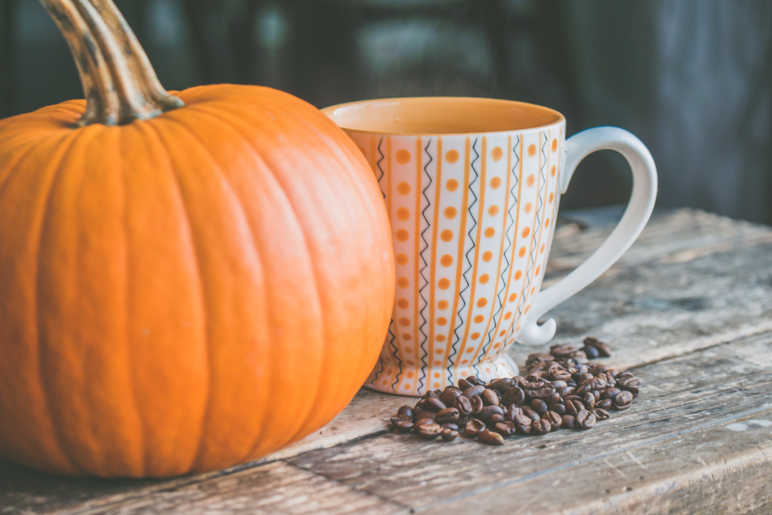 Orange Pumpkin A Mug And Organic Coffee Beans On Wood Table For Making Healthier Pumpkin Spice Lattes