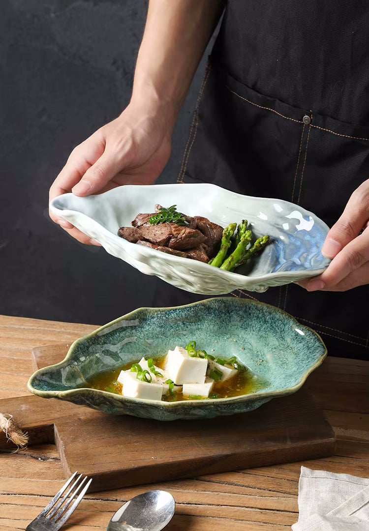 Chef Serving Two Gourmet Dishes Seashore Oyster Shaped Ceramic Serveware