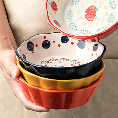 Holding Stack Of Colorful Ceramic Bowls In Cottage Vintage Style